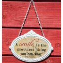 Türschild A Smile Is The Prettiest Thing You Can Wear - Schild im Antik Look